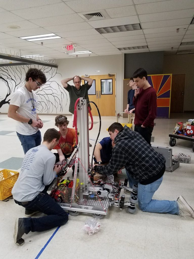 Phoenix Robotics team troubleshooting their 2017 robot