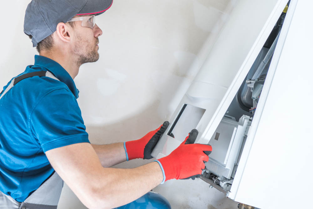 a homeowner inspecting their heating system
